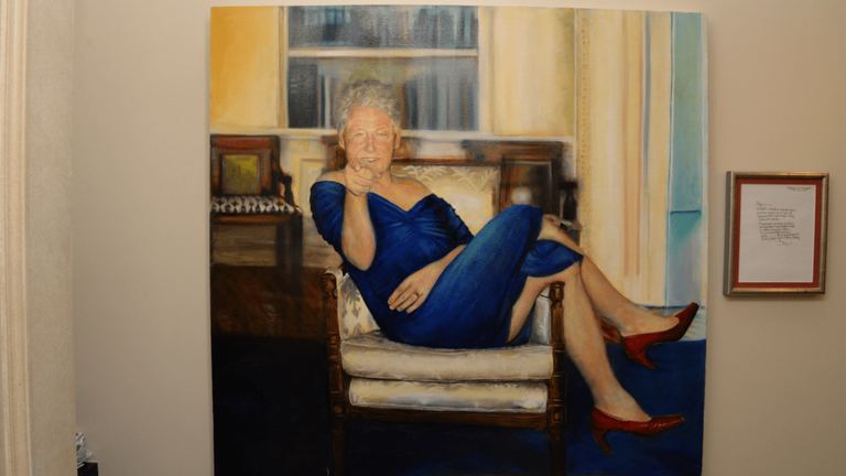 A painting of Bill Clinton in a dress was among the images released. Pic: US DoJ