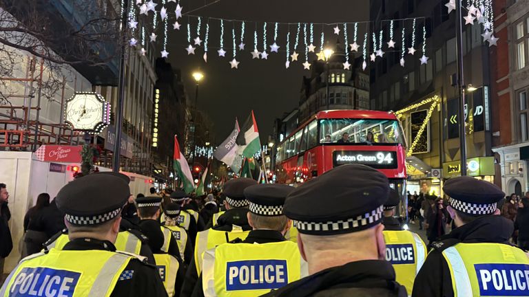 Pro-Palestine protesters march down Oxford Street. Pic: PA