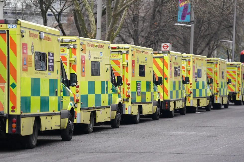 Ambulances parked outside London Ambulance Service NHS Trust control room in Waterloo, London