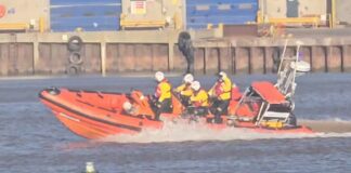 Search for two people in water off beach in Devon under way | UK News