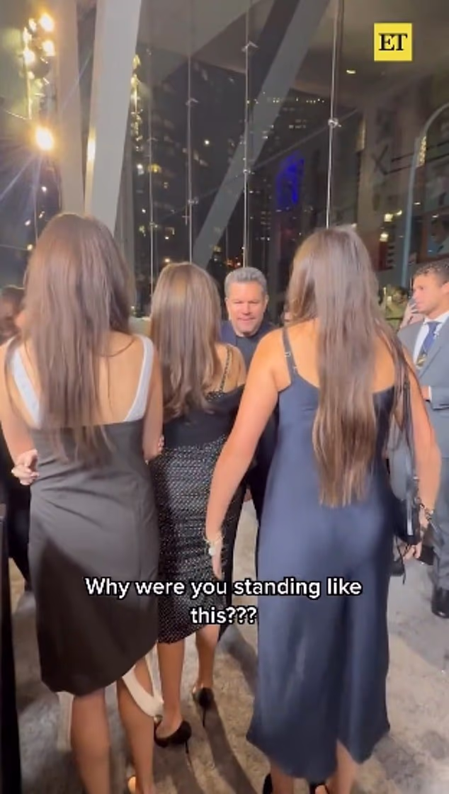 She asked: 'Why are you standing like this?' before imitating his position by hunching forward and dramatically flaring her arms out to the sides causing her dad to burst out laughing