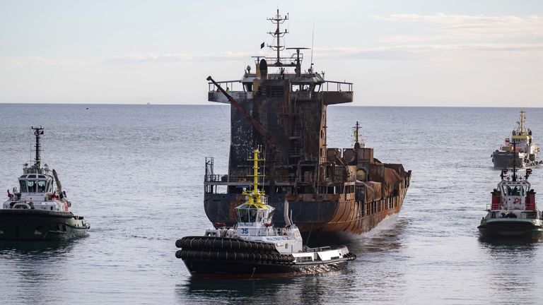 The stricken container ship the Solong, which was involved in a collision with a tanker in the North Sea, is towed in to the port of Aberdeen. The Solong collided with the anchored tanker Stena Immaculate about 12 miles off the coast of East Yorkshir