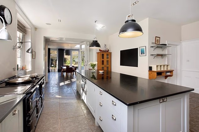 The house also boasts two offices, a 35ft dining room and a large kitchen and breakfast room heated by an Aga