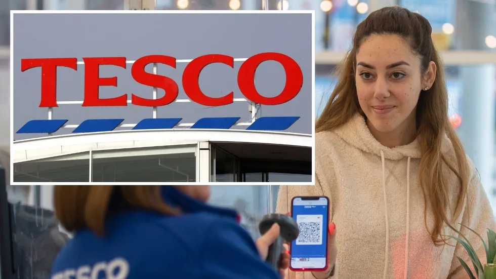 Tesco sign and Tesco Clubcard member showing card on phone