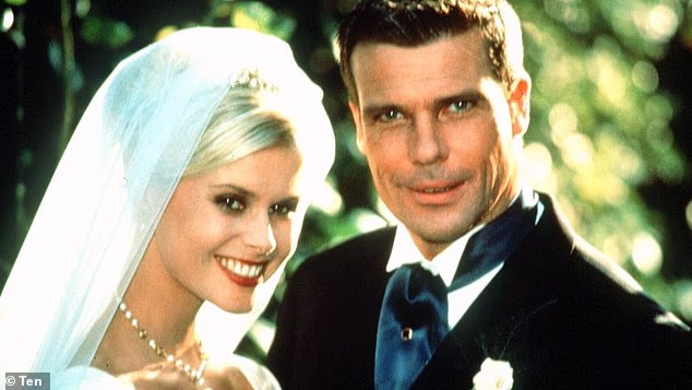 'Being famous in England was surreal. The level of recognition that I got was on another scale,' she said. Emma is pictured with Neighbours co-star Graham Harvey