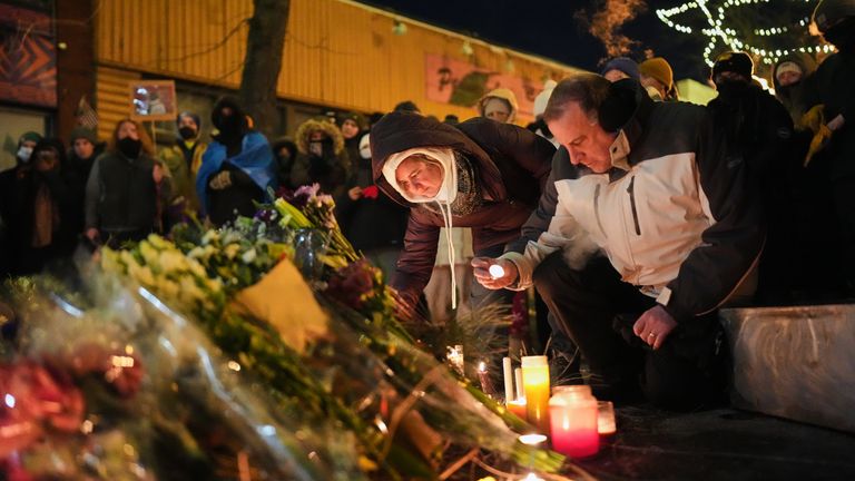 People gather during a vigil for 37-year-old Alex Pretti, who was fatally shot by a US Border Patrol officer. Pic: AP