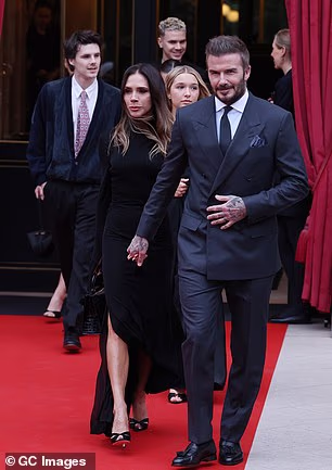 David appeared to lead the way as the family ventured out in Paris, where Victoria will earn her latest accolade by becoming a Knight of the Order of Arts and Letters