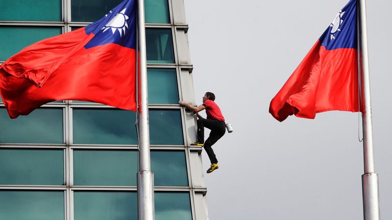 Alex Honnold during his free solo climb of the Taipei 101 skyscraper. Pic: AP