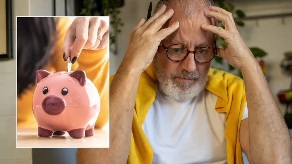 Man looking worried and piggy bank