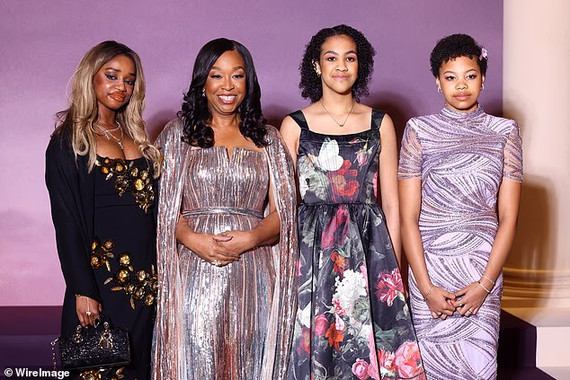 The 56-year-old TV impresario has kept her personal life largely out of the public eye but made an exception for Wednesday's event at the Palais Brongniart