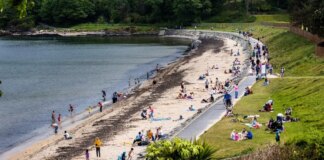 Woman in her 60s dies and two others injured after getting into trouble off popular UK beach