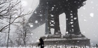 US weather: Thousands of flights cancelled and more than 820,000 homes without power as huge winter storm hits | US News