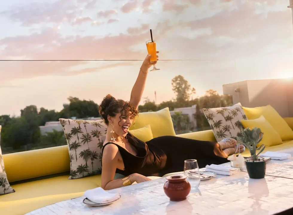 Woman cheers on holiday