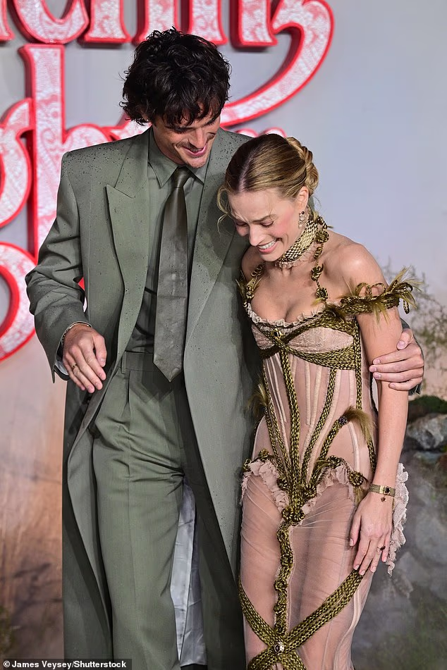 Margot and Jacob, whose chemistry while promoting the film has already raised eyebrows, put on a giddy display as they arrived for the premiere
