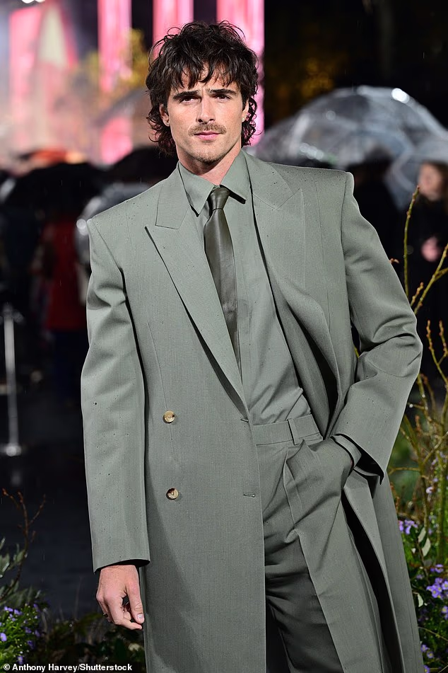 Jacob cut a dapper figure in his sharp all-green suit at the premiere