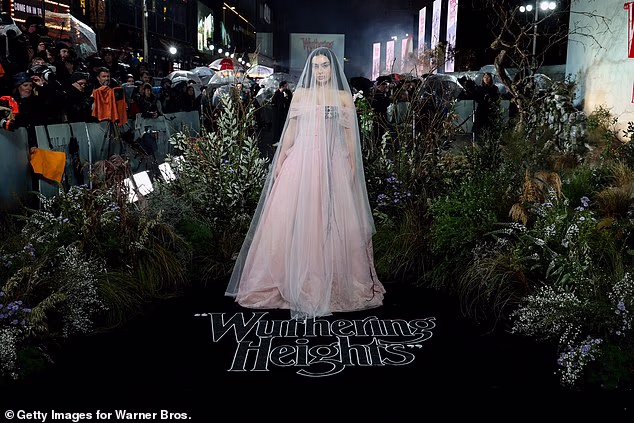 Channelling the passionate heroine Catherine Earnshaw, Charli arrived in a dusky pink gown with a matching bridal veil