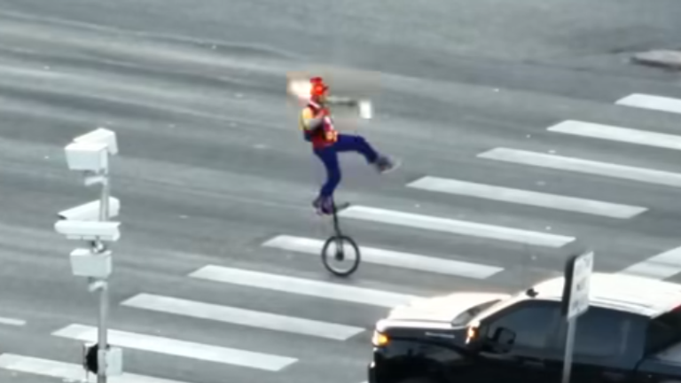 The man even balances on one leg. Pic: Commerce City Police Department