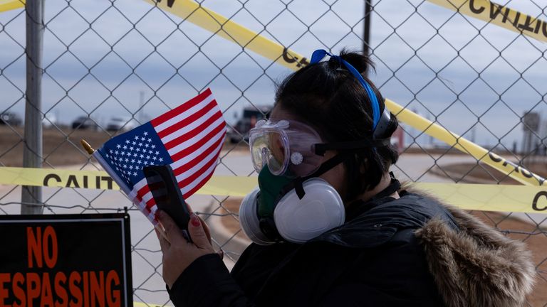 A protester at the South Texas Family Residential Center in Dilley, Texas, last week. Pic: Reuters