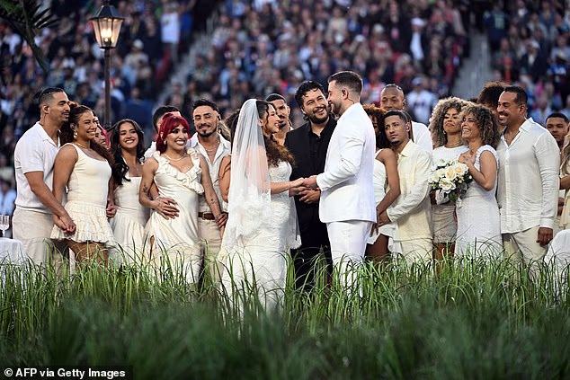 Love was in the air during the halftime show as the pair exchanged vows