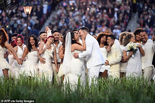 The couple 'invited Bad Bunny to their wedding and in turn he invited them to get married during his performance,' NBC News' Rohan Nadkarni said on X
