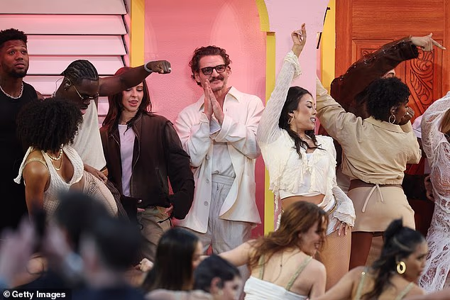 Pedro Pascal was pictured hanging out among dancers on stage during the show