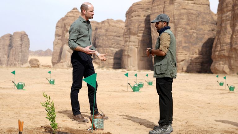 William speaks with a member of the RCU's Habitat and Restoration team. Pic: Reuters