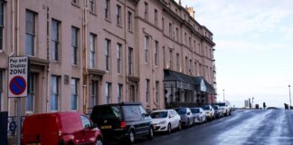 hotel to be repainted after owners made it pink without permission