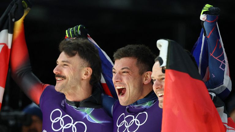 Weston celebrates with the other medallists. Pic: Reuters