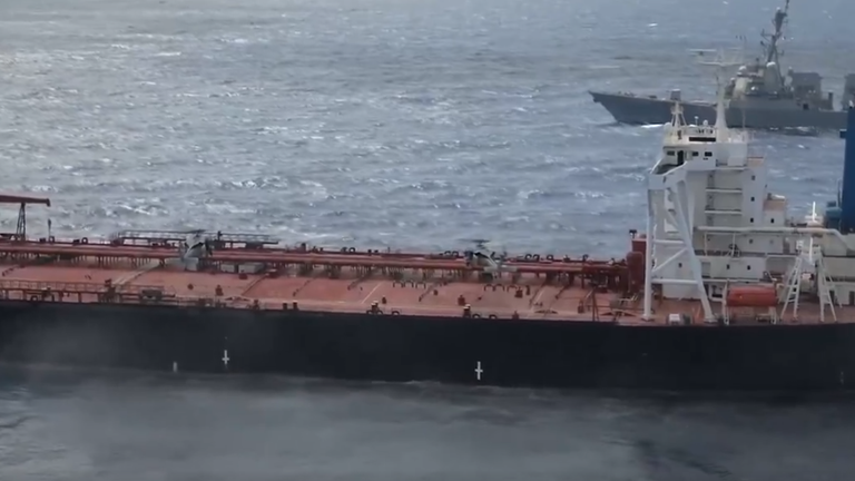 The US described the operation as a 'right-of-visit, maritime interdiction and boarding. Pic: X/Department of War