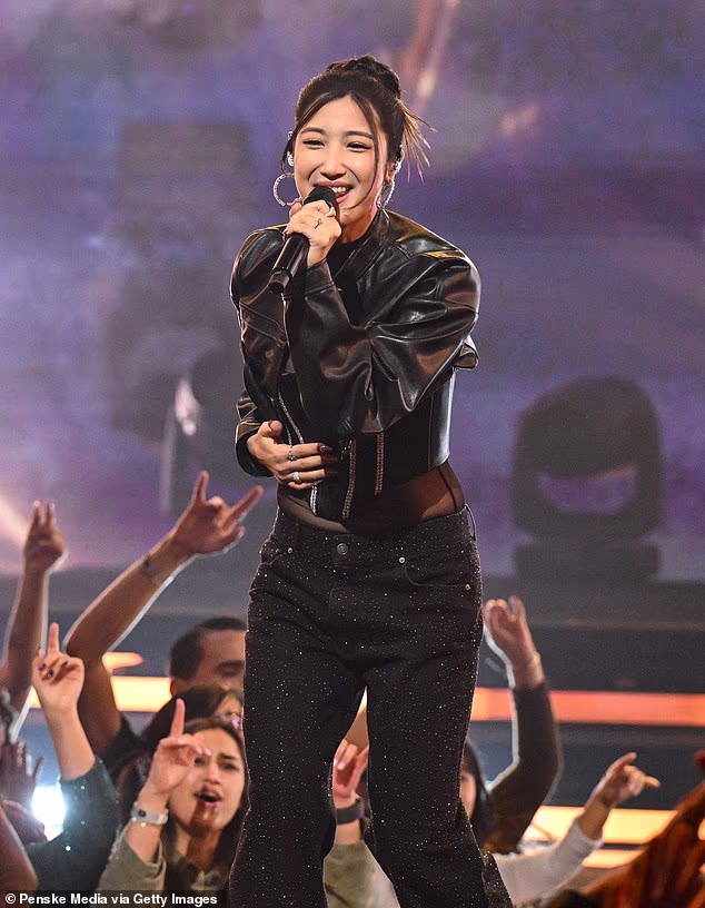 Ejae, who performed the music from the hit film, is pictured performing at Dick Clark's New Year's Rockin' Eve