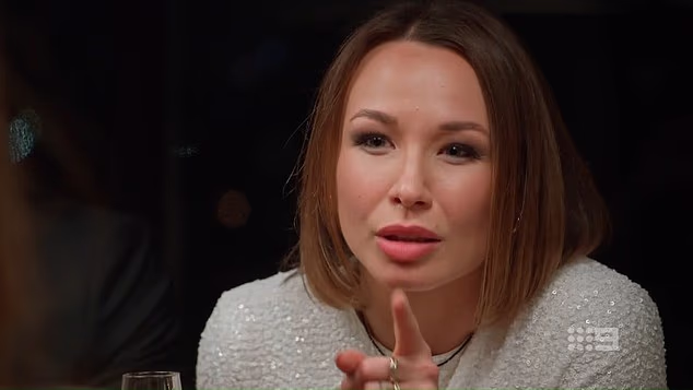 Behind insults about bad hair extensions and cheap Target boots lies a far bigger story - one involving formal complaints, legal letters, and a bitter dispute over duty of care. (Bride Stella Mickunaite pictured at the dinner party)