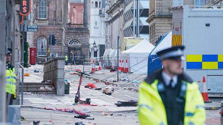 Police tents and debris at the scene in Water Street in Liverpool. Pic: PA