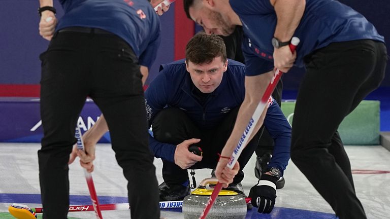 Britain's Bruce Mouat, Grant Hardie and Hammy McMillan. Pic: AP