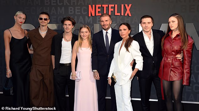 The Beckham family in 2023  before a feud broke out between Brooklyn (second from right) and his wife Nicola Peltz (far right) and the rest of the family. David and Victoria's camp have  blamed Nicola for the fractured relationship with their son
