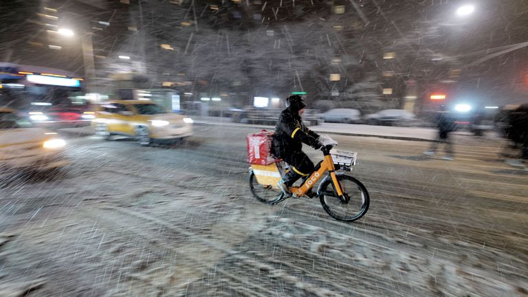 DoorDash delivery services were later cancelled as the snow moved in. Pic: AP