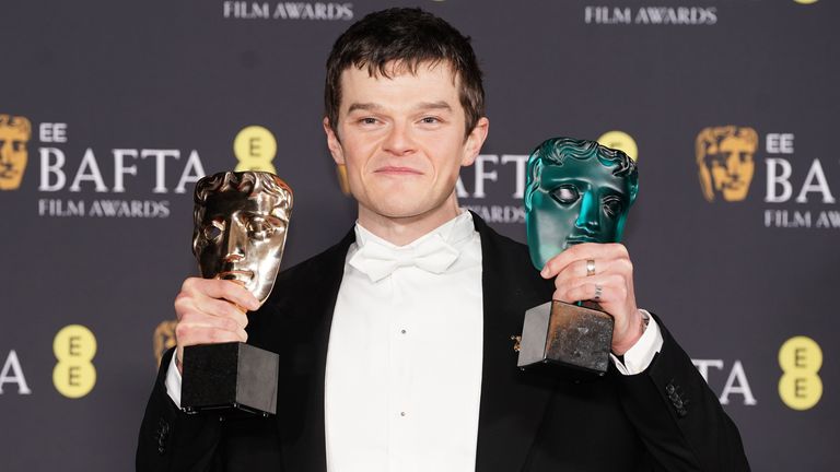 Robert Aramayo with his two BAFTA awards. Pic: PA