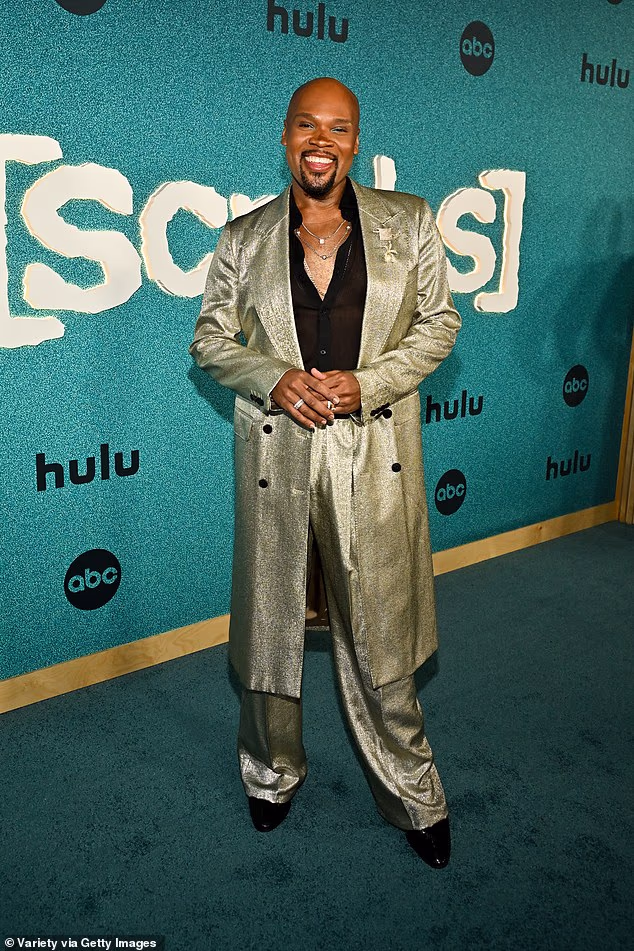 Scott wore an eye-catching metallic gold suit