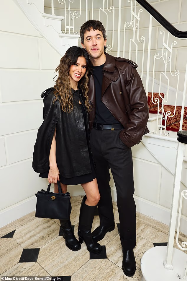 Tom Blyth and his girlfriend Daniela Normal put on a loved-up display for the cameras as they arrived at the party