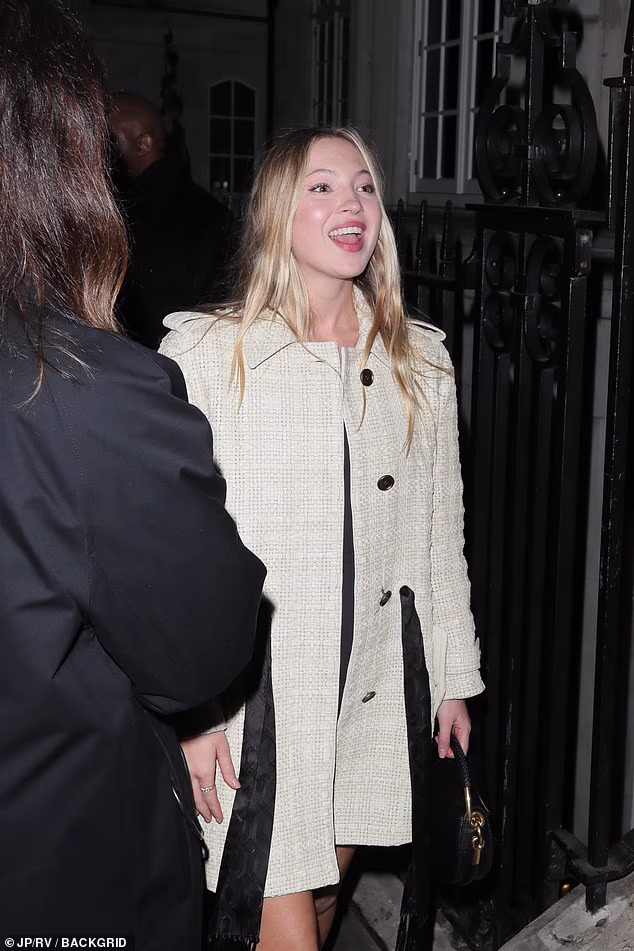 She was all smiles as she arrived at the event