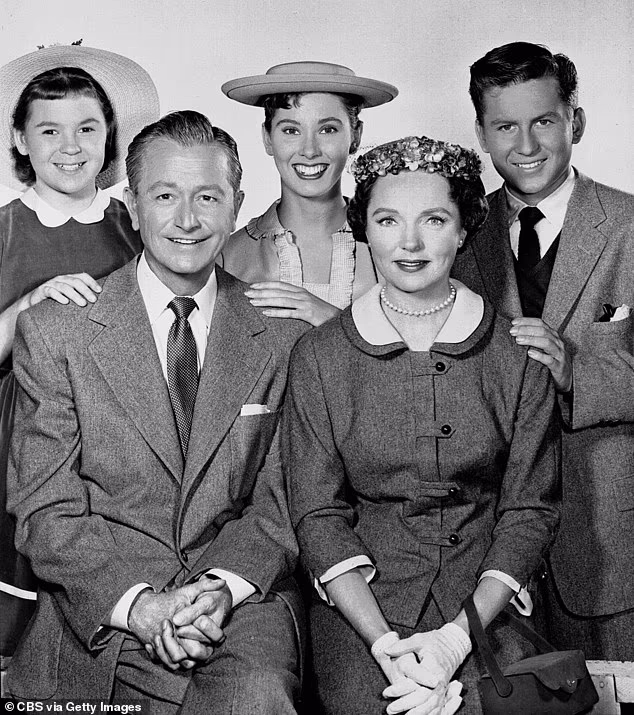 Seen far left with her screen family in 1958