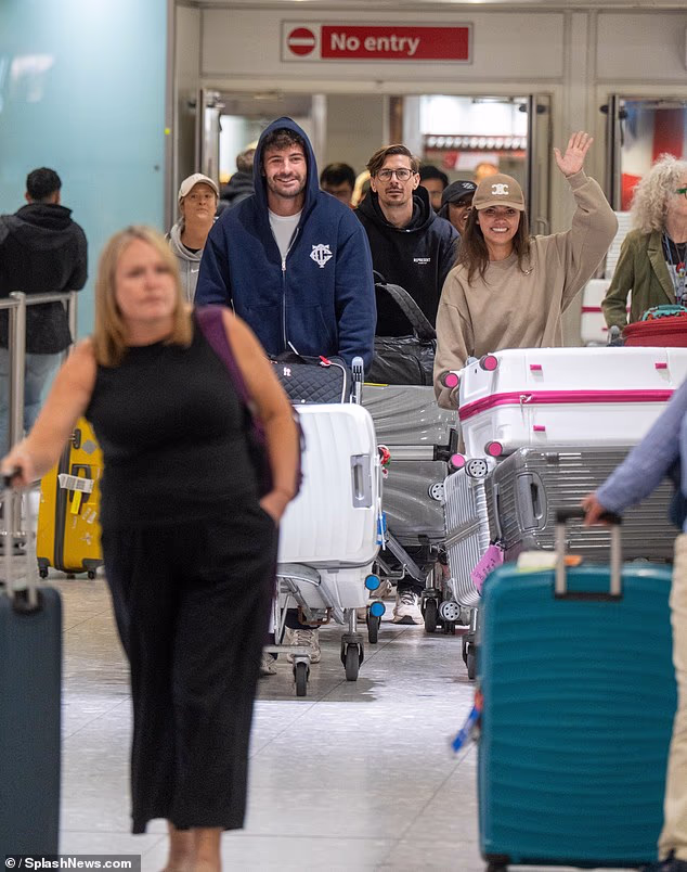 She completed her airport outfit with a matching Celine baseball cap, which retails for £420, as she flashed a smile and a wave for the cameras