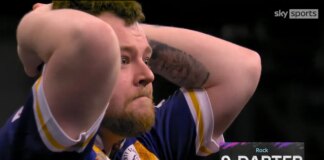 Josh Rock hits a nine-darter to send home Belfast crowd into a frenzy as he wipes away tears