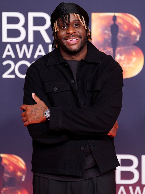 Myles Smith keeping his look simple, and emanating his normal warmth on the red carpet. Pic: PA