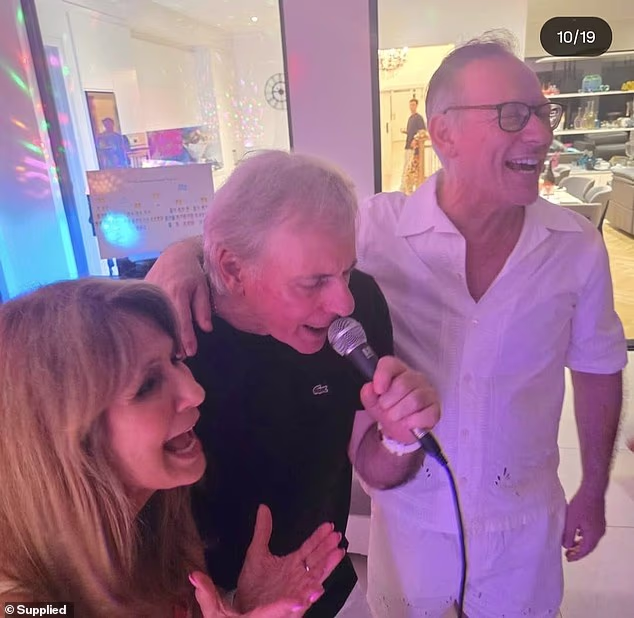 'Michael is my uncle. He's my father's brother,' she said. Dr Michael Zacharia (right) is pictured with his brother Lee (centre) and Lee's wife Suzie (left)