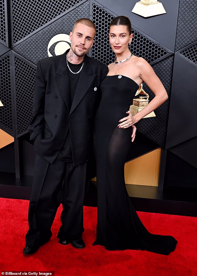 Justin Bieber, 31, and wife Hailey, 29, are 'doing great as a couple' following his bizarre Grammys return; Pictured at the Grammys in Los Angeles on February 1