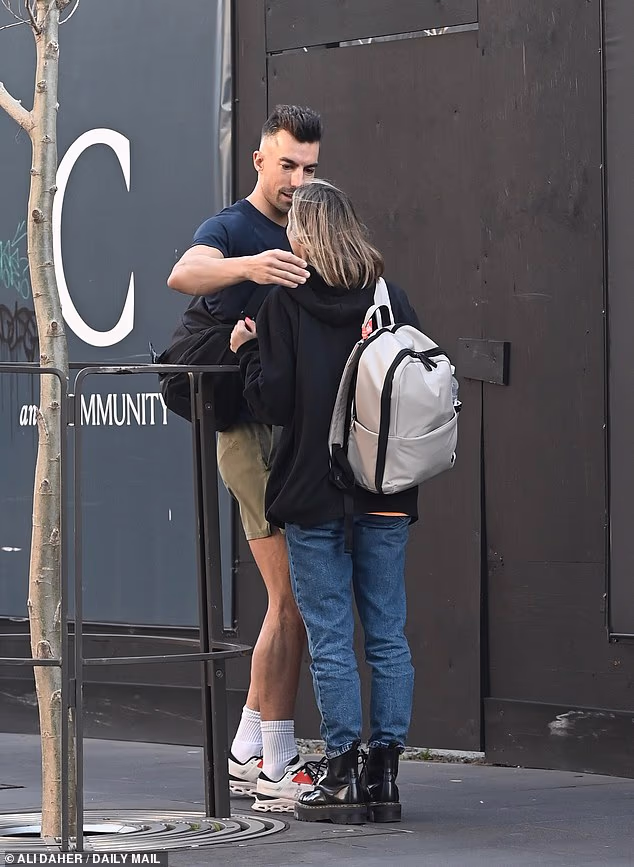 And just hours after being spotted clutching a bouquet of sunflowers in what appeared to be a last-ditch attempt at winning her back, his bride was seen being comforted by another groom.(Julia pictured with Filip Gregov)