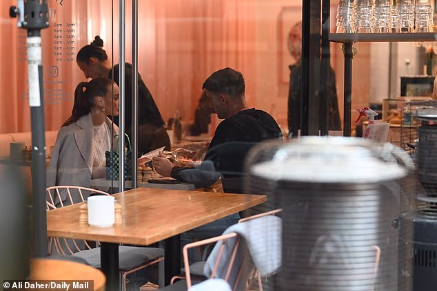 Meanwhile, Chris looked every inch the lad in a black T–shirt, matching bomber jacket, jeans and Panda Dunks