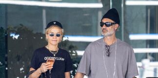 Rita Ora, 35, puts on a leggy display in skimpy shorts as she enjoys a romantic stroll hand-in-hand with husband Taika Waititi, 50, in LA