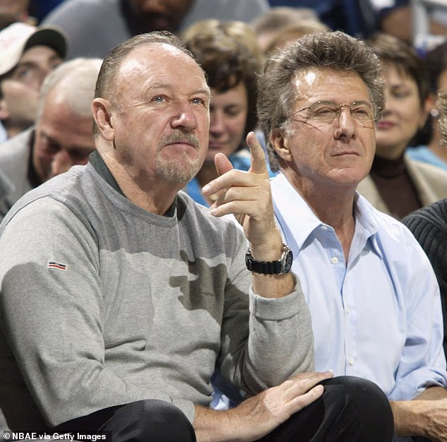 Gene and Dustin pictured at the Miami Heat and New Orleans Hornets game at New Orleans Arena on November 2, 2002