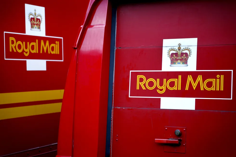 Royal Mail delivery lorries and minivans parked in the car park of the Mount Pleasant Post Office